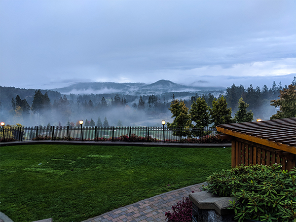 some mountains covered in fog on Vancouver Island